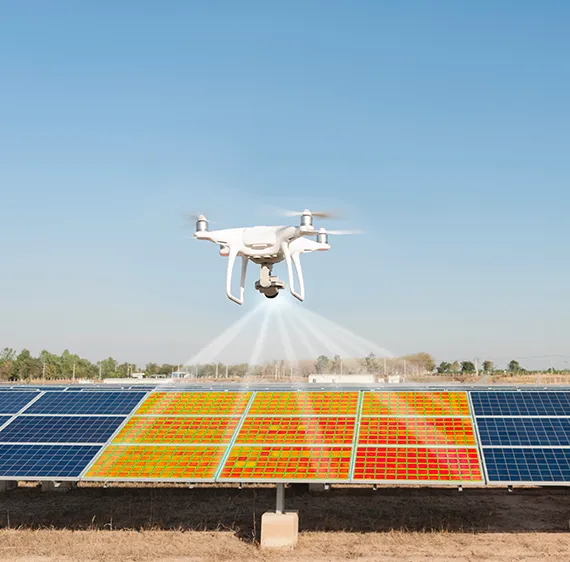 Drone doing an inspection of solar panels.