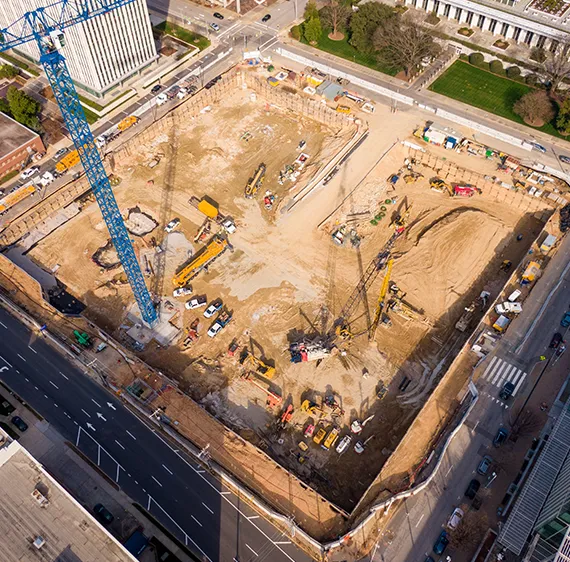 Aerial photo of construction site with crane.